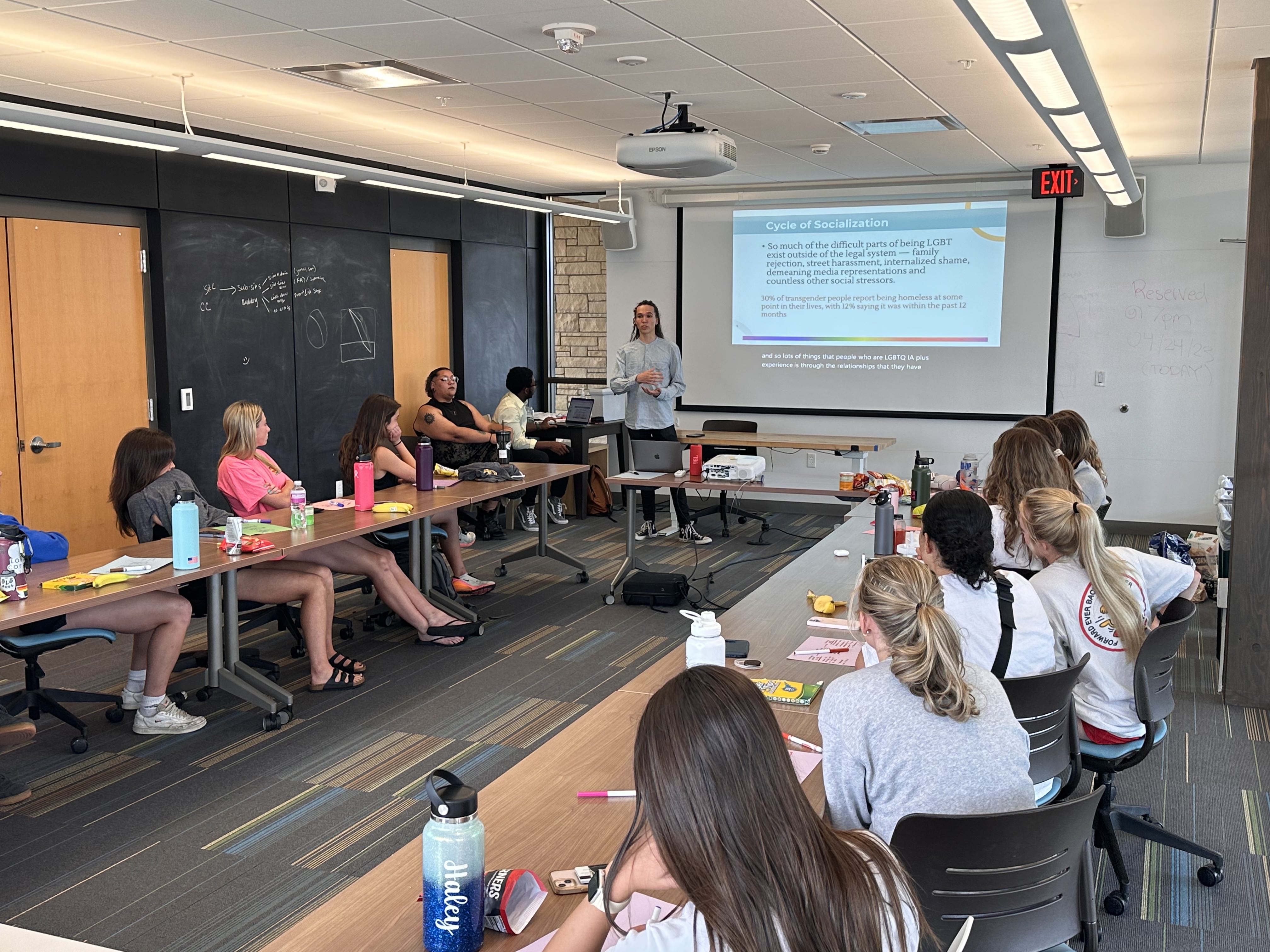 students presenting a diversity training to their peers. 